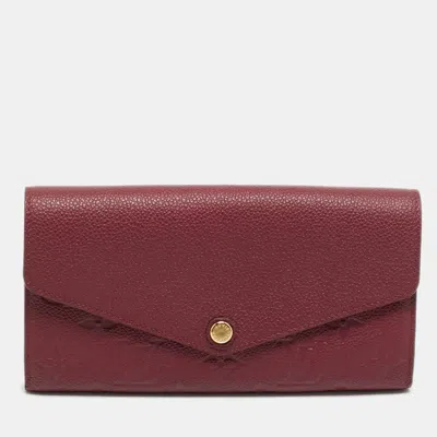 Pre-owned Louis Vuitton Sarah Aurore Monogram Empreinte Leather Continental Wallet In Burgundy