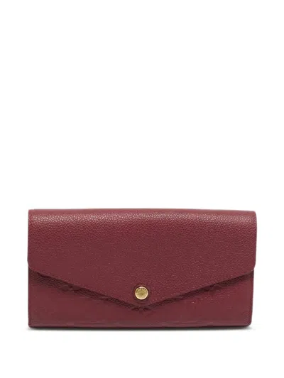 Pre-owned Louis Vuitton Sarah Monogram Empreinte Wallet In Red