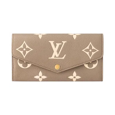 Pre-owned Louis Vuitton Sarah Wallet 'tourterelle Gray/cream Monogram Embossed Empreinte Cowhide Leather' | Ta In Brown