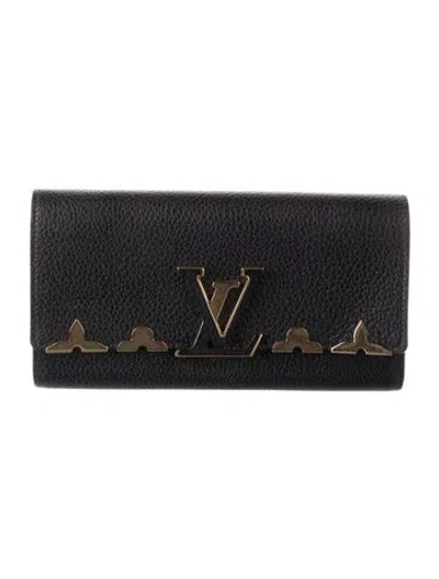 Pre-owned Louis Vuitton Taurillon Leather Capucines Wallet In Black