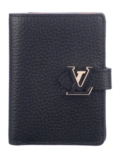 Pre-owned Louis Vuitton Taurillon Leather Capucines Wallet In Black