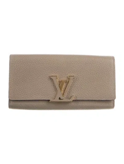 Pre-owned Louis Vuitton Taurillon Leather Capucines Wallet In Neutral