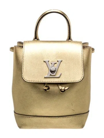Pre-owned Louis Vuitton Taurillon Leather Lockme Backpack Mini In Gold
