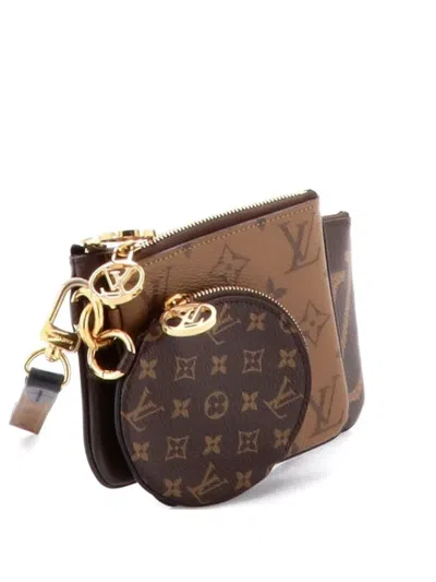 Pre-owned Louis Vuitton Trio Pouch Set Reverse Monogram Giant Clutch Bag In Brown
