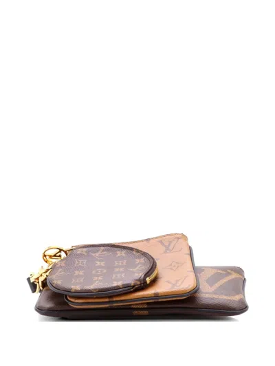 Pre-owned Louis Vuitton Trio Pouch Set Reverse Monogram Giant Clutch Bag In Brown