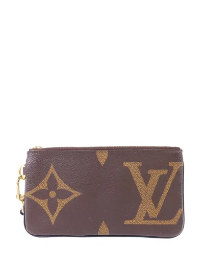 Pre-owned Louis Vuitton Trio Reverse Monogram Giant Clutch Bag In Brown