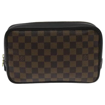 Pre-owned Louis Vuitton Trousse De Toilette 25 Brown Canvas Clutch Bag ()