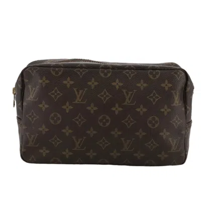 Pre-owned Louis Vuitton Trousse De Toilette Brown Canvas Clutch Bag ()