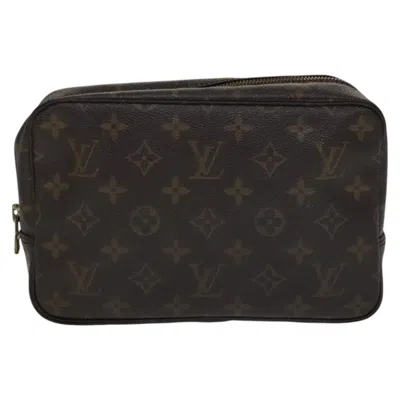 Pre-owned Louis Vuitton Trousse De Toilette Brown Canvas Clutch Bag ()