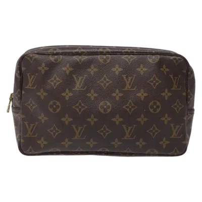 Pre-owned Louis Vuitton Trousse De Toilette Brown Canvas Clutch Bag ()