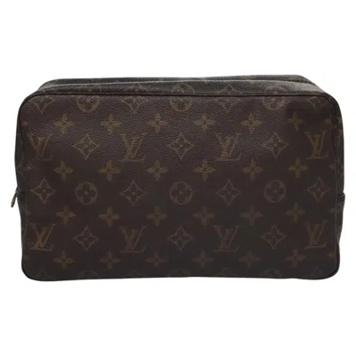 Pre-owned Louis Vuitton Trousse Toilette 28 Brown Canvas Clutch Bag ()