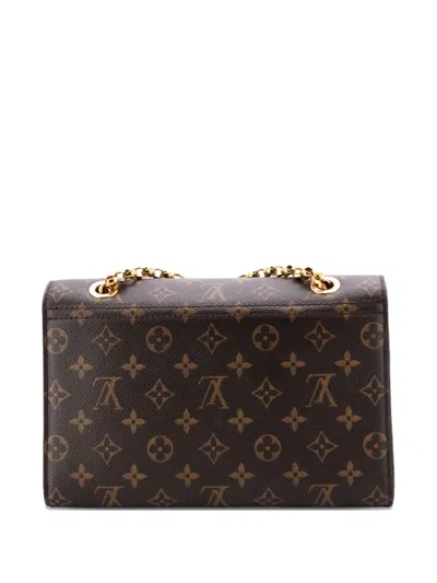 Pre-owned Louis Vuitton Victoire Handbag Monogram Canvas And Leather Shoulder Bag In Brown
