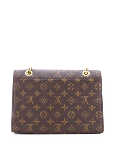 Pre-owned Louis Vuitton Victoire Handbag Monogram Canvas And Leather Shoulder Bag In Brown