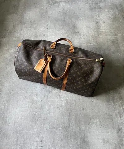 Pre-owned Louis Vuitton Vintage  Keepall 60 Monogram Bag In Brown