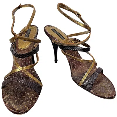 Pre-owned Louis Vuitton Vintage  Monogram Gold Python Strappy Stiletto Sandals, 37.5 In Black