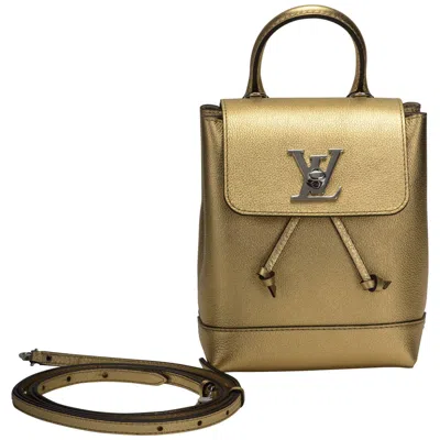 Pre-owned Louis Vuitton Vuitton Sold Out New Gold Lockme Mini Backpack In Brown