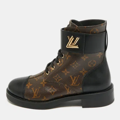 Pre-owned Louis Vuitton Wonderland Flat Ranger Size 41 Black Monogram Canvas And Leather Combat Boots In Brown