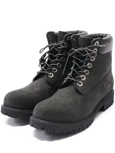 Pre-owned Louis Vuitton X Timberland Monogram-embossed Leather Ankle Boots In Black