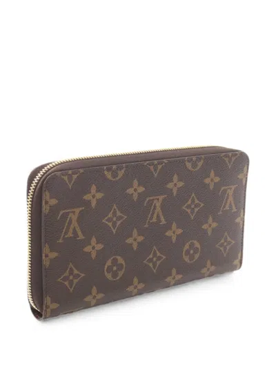 Pre-owned Louis Vuitton Zippy Monogram Wallet In Brown