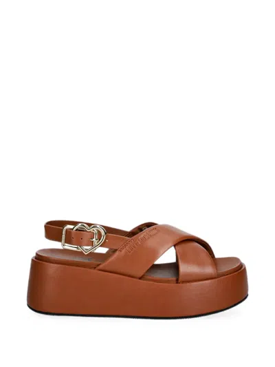 Love Moschino Crossover-strap Heart-buckle Sandals In Brown