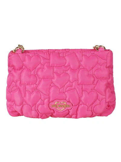 Love Moschino Heart Embroidered Logo Embossed Shoulder Bag In Fuxia
