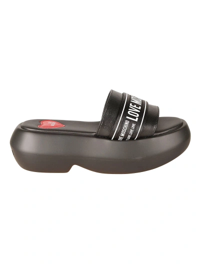 Love Moschino Heart Patched Sandals In Black