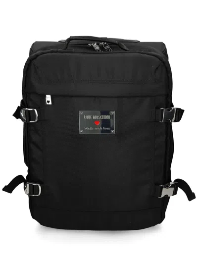 Love Moschino Logo Plaque Luggage In Schwarz