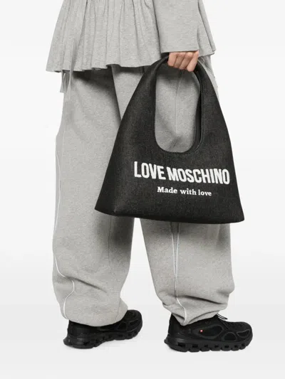 Love Moschino Logo-appliqué Denim Shoulder Bag In Black