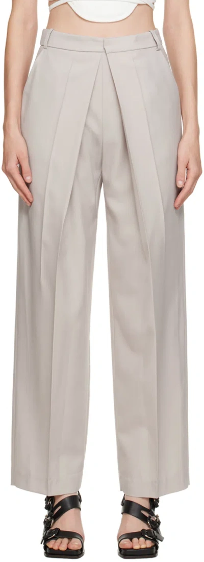 Low Classic Beige Deep Tuck Trousers In Light Beige