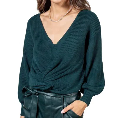 LUCY PARIS TWIST FRONT SWEATER IN GREEN