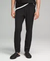 Lululemon Abc Skinny-fit 5 Pocket Pants 30l Warpstreme In Black