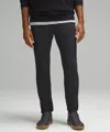Lululemon Abc Skinny-fit 5 Pocket Pants 34l Warpstreme In Black