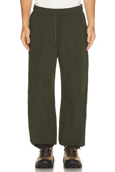 Lululemon Crinkled Nylon Hybrid Track Pant In Green