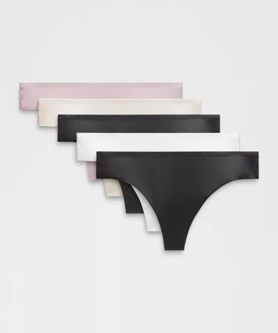 Shop Lululemon Invisiwear Mid-rise Thong Underwear 5 Pack