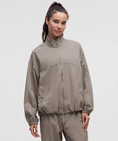 Lululemon License To Train Woven Oversized Jacket In Brown