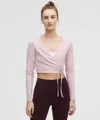 Lululemon Nulu Long-sleeve Cropped Wrap In Pink