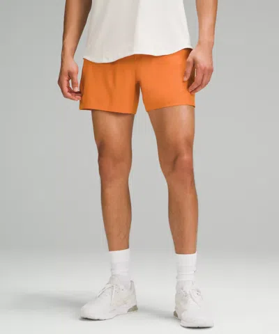 Lululemon Pace Breaker Linerless Shorts 5" In Orange