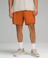 Lululemon Pace Breaker Linerless Shorts 7" In Orange