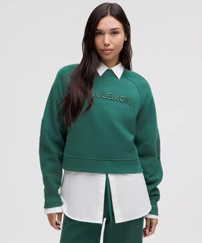 Lululemon Scuba Oversized Pullover Wordmark In Green