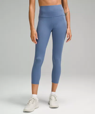 Lululemon Wunder Train High-rise Crop With Pockets 23" In Blue