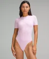 Lululemon Wundermost Bodysuit - Ultra-soft Nulu Short-sleeve Crew Thong Bodysuit In Pink