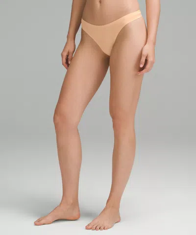 Lululemon Wundermost Ultra-soft Nulu Dipped-waist Thong Underwear In Neutral