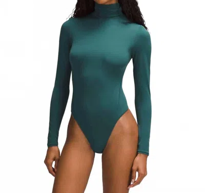 Lululemon Wundermost Ultra-soft Nulu Turtleneck Bodysuit In Storm Teal In Green