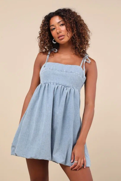 Lulus Charmed Aura Light Wash Denim Tie-strap Bubble-hem Mini Dress In Blue
