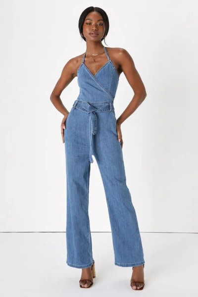 Lulus Flirty Throwback Medium Wash Denim Surplice Halter Jumpsuit In Blue