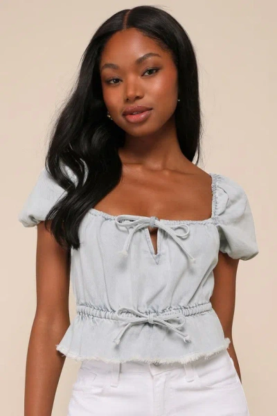 Lulus Unique Arrival Light Wash Denim Puff Sleeve Tie-front Top In Blue