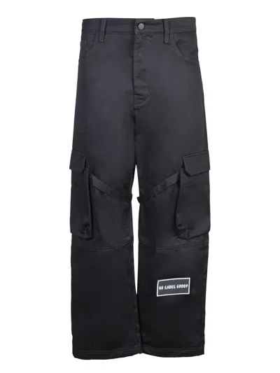 M44 Label Group Trousers In Black