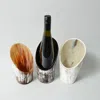 Maadili Collective Nestled Horn Wine Holder In Multi