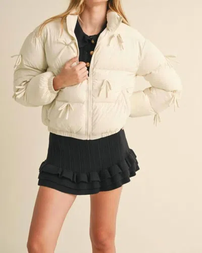 Mable Bow Puffer Jacket In Ecru In White