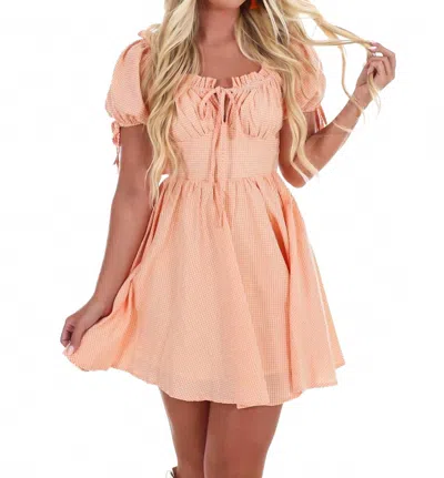 Mable Pom Pom Plaid Mini Dress In Orange